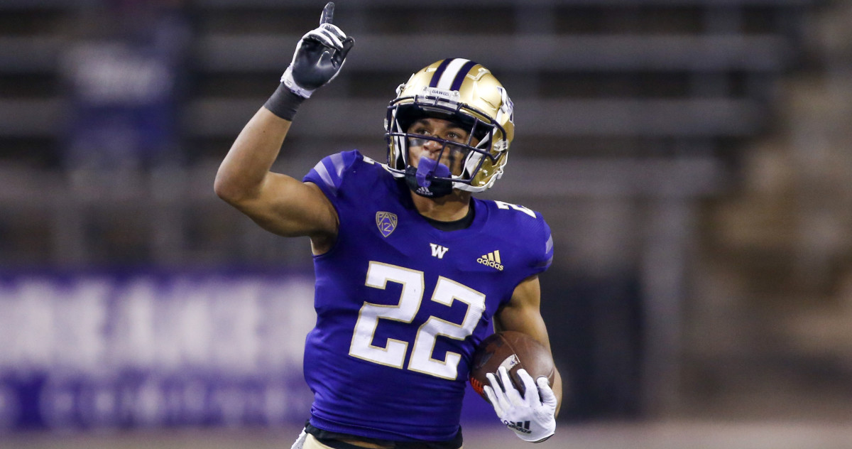 Washington defensive back Trent McDuffie (22) celebrates following an interception against Utah on Nov. 28, 2020.